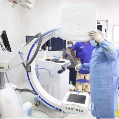 Members of our theatre team prepare the new C-arm fluoroscopy system for image-guided orthopaedic surgery