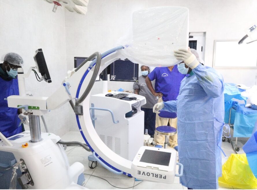 Members of our theatre team prepare the new C-arm fluoroscopy system for image-guided orthopaedic surgery