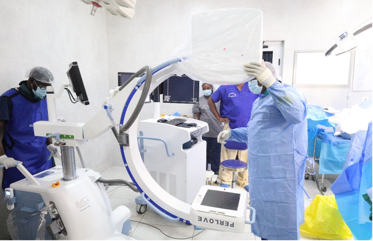 Members of our theatre team prepare the new C-arm fluoroscopy system for image-guided orthopaedic surgery